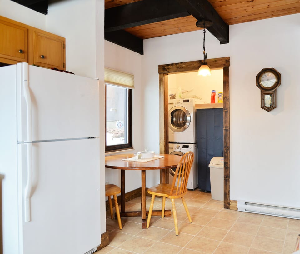 Breakfast nook and laundry unit. 