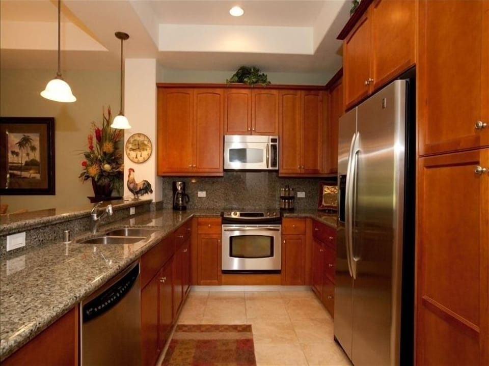 Kitchen with stainless steel and granite counter tops