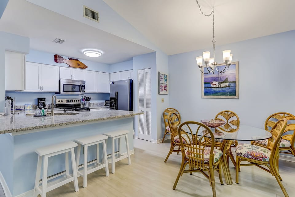Dining Area with Seating for Six and Bar Seating Area for Three