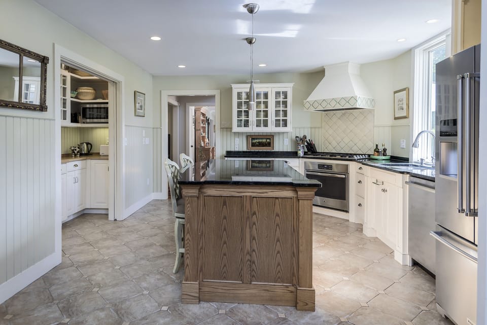 kitchen fully quipped,  pantry to the left,
new appliances, huge island.