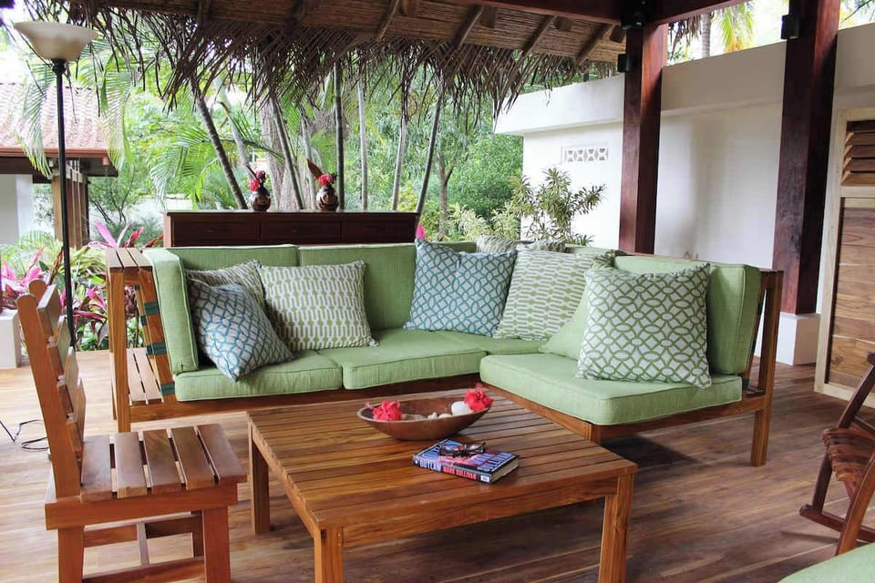 Interior of the rancho, with dining, living room, kitchen, bathroom and shower