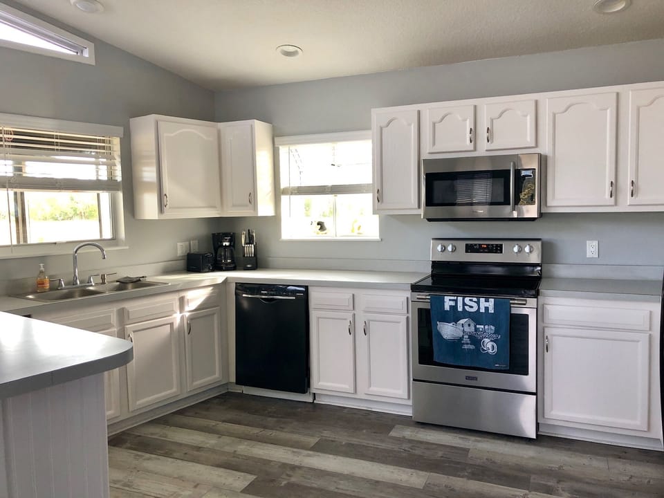 Large kitchen has everything you need to craft the meal or beverage you want.