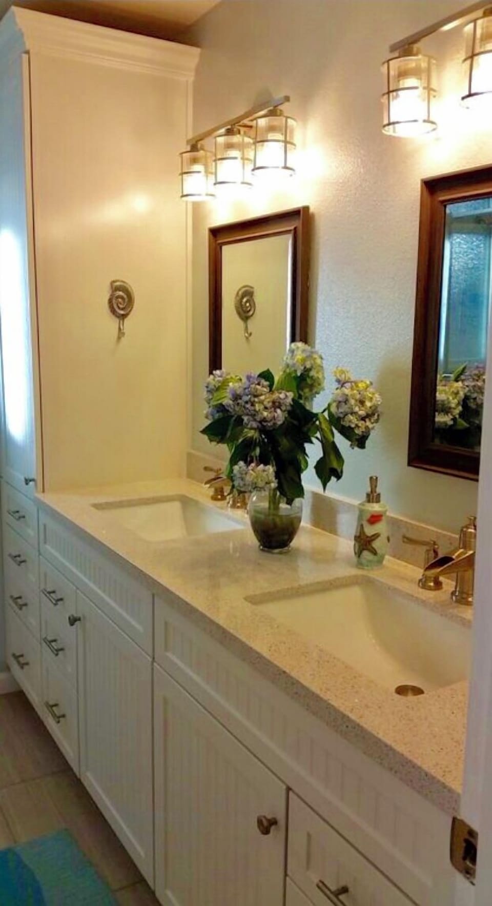 Full bath with quartz counter, dual sinks, ample storage cabinets