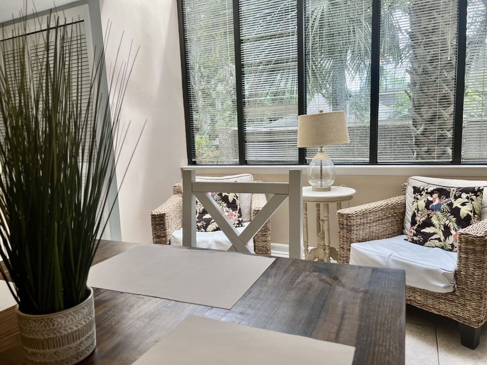 Large sky light window with cozy chairs