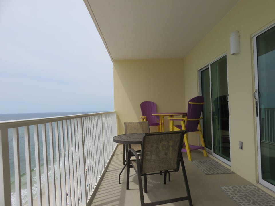 west end of the balcony, counter height table & 2 chairs
