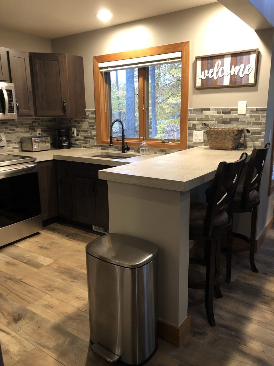 Newly renovated, poured concrete counters, farm sink