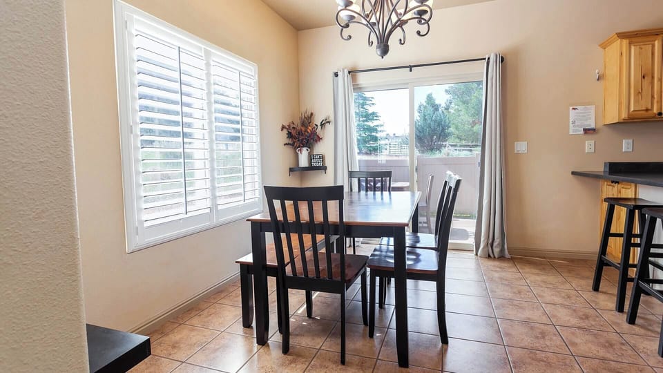 Indoor or outdoor dining, the choice is yours. The dining room seamlessly connects to the patio, offering an option for al fresco dining.