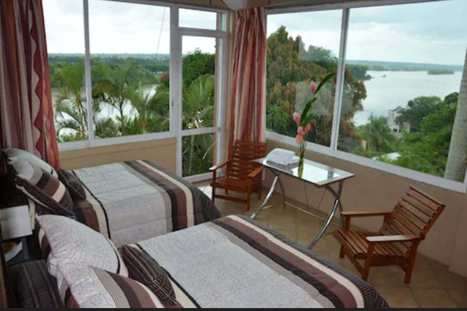 Design Quadruple Room, 2 Double Beds, Non Smoking, River View | In-room safe, blackout drapes, iron/ironing board, WiFi (free)