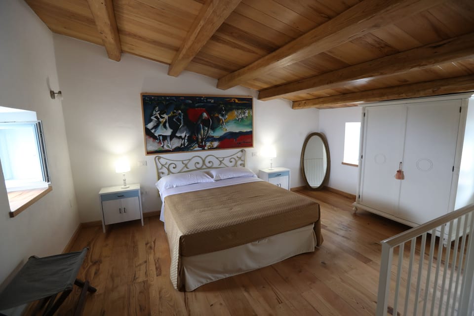 Suite, Garden View | Minibar, in-room safe, individually decorated, individually furnished