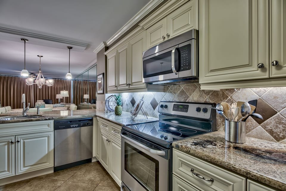 New range, microwave and dishwasher.