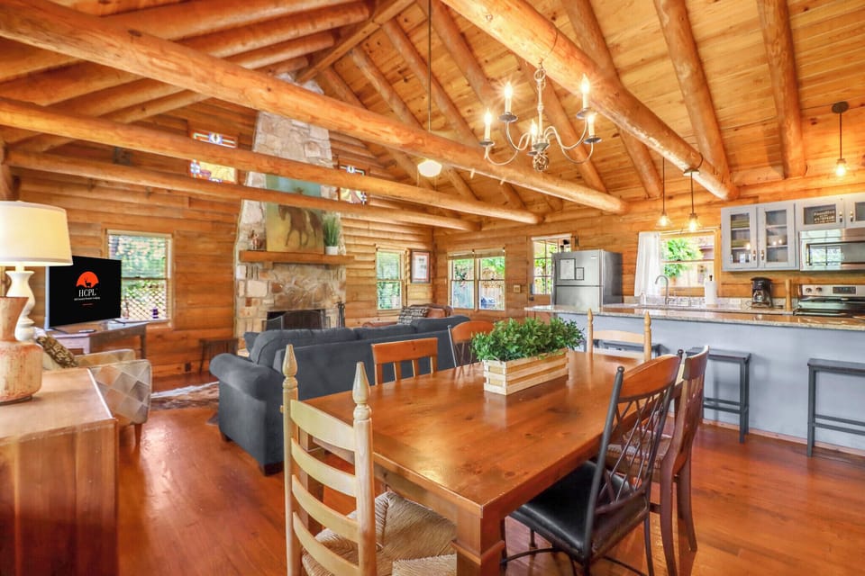 Looking into the living area and kitchen from the dining table