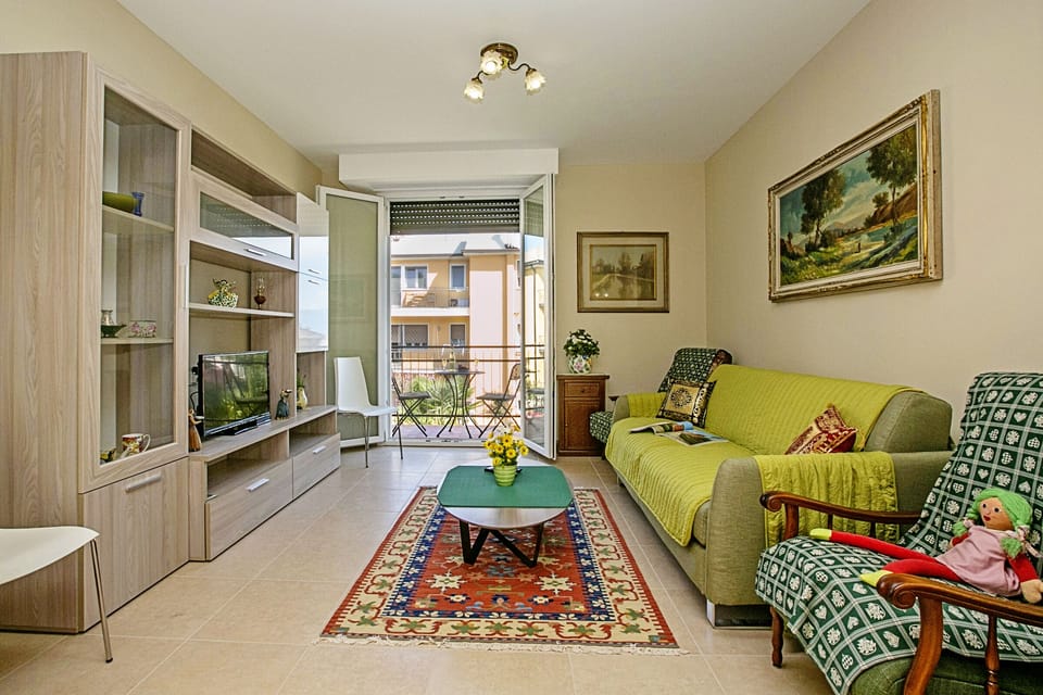 Large living room leading onto the balcony
