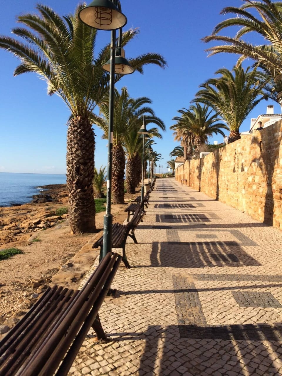 Praia da Luz promenade accessing both sandy beaches, rock pools, restaurants and cafes.