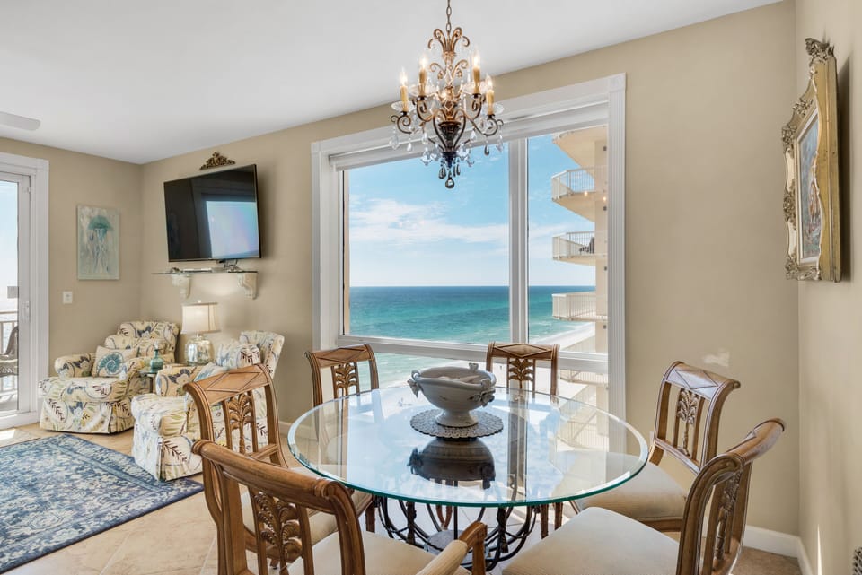 Dining room area, with beautiful ocean views, and seating for 10 guests.
