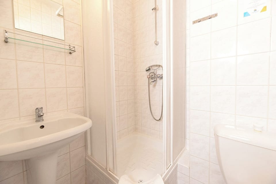 Double Room, Balcony | Bathroom | Shower, towels, toilet paper