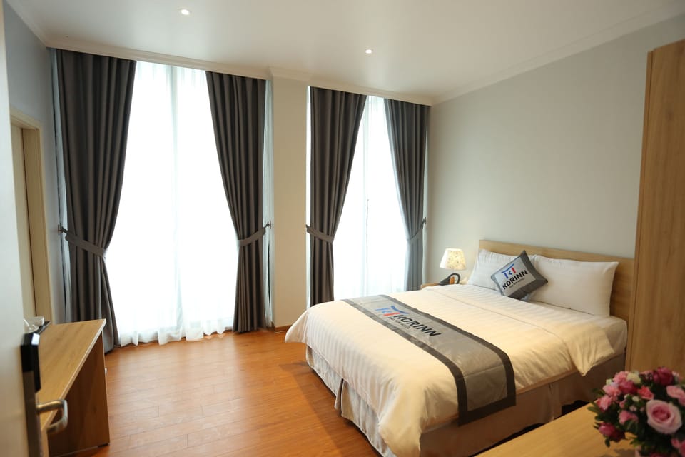 Standard Double Room | Minibar, in-room safe, desk, blackout drapes