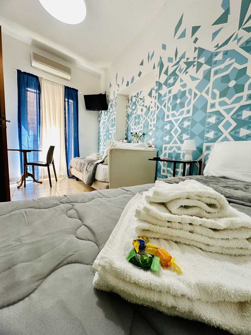 Comfort Twin Room, City View (Carmine) | Minibar, individually decorated, desk, blackout drapes
