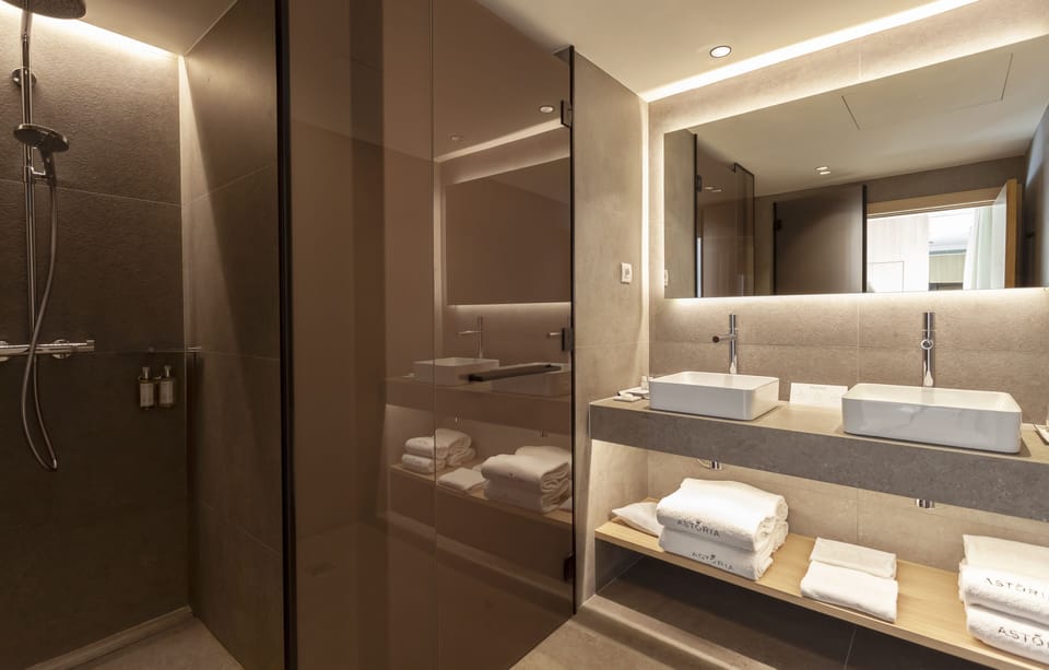 Eco-friendly toiletries, hair dryer, towels