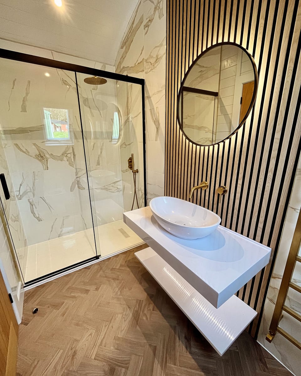 Designer toiletries, hair dryer, bathrobes, slippers