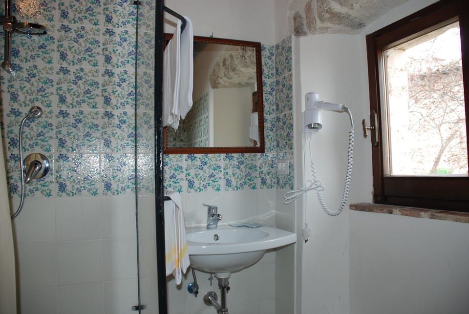 Economy Double Room, Mountain View | Bathroom | Free toiletries, hair dryer, bidet, towels