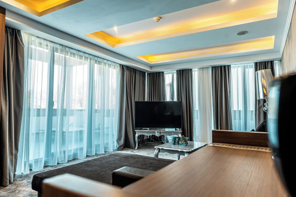 Luxury Apartment, Park View | Living area | Flat-screen TV