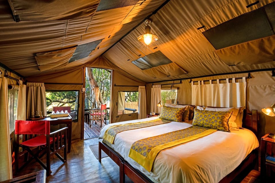 Luxury Tent, 1 Large Twin Bed, Non Smoking, River View | In-room safe, desk, bed sheets