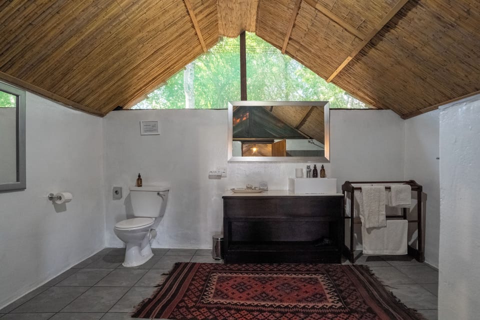 Luxury Tent, 1 Large Twin Bed, Non Smoking, River View | Bathroom | Shower, free toiletries, hair dryer, bathrobes