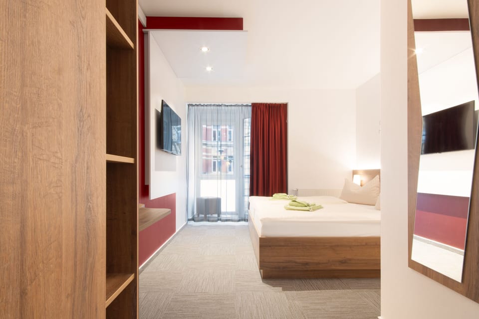 Hypo-allergenic bedding available, laptop workspace, blackout drapes