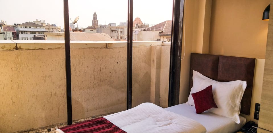 Deluxe Single Room | Soundproofing, free WiFi, bed sheets