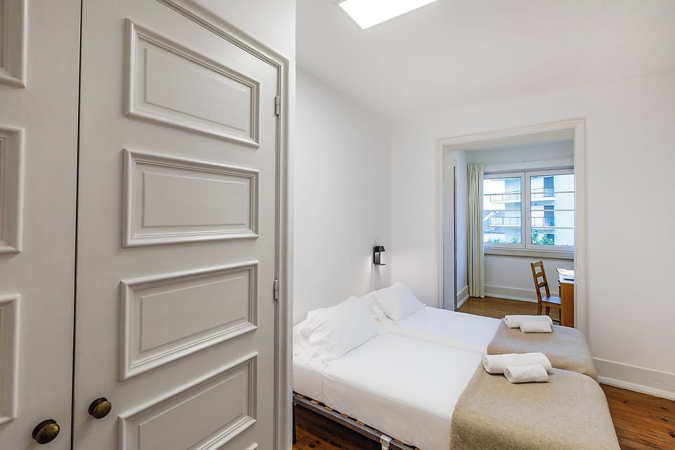 Twin Room, Private Bathroom | Down comforters, free WiFi, bed sheets