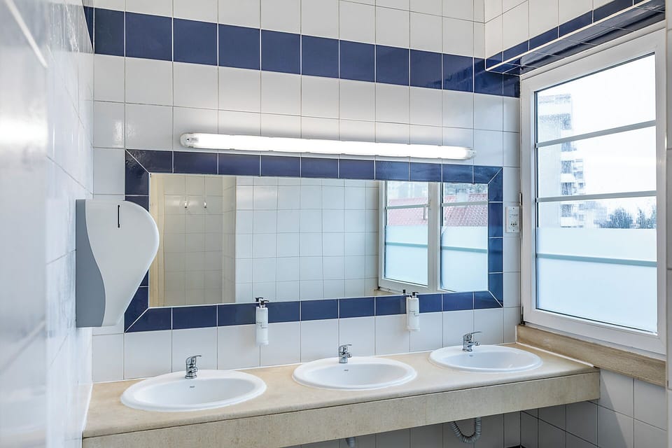 Shower, rainfall showerhead, hair dryer, towels