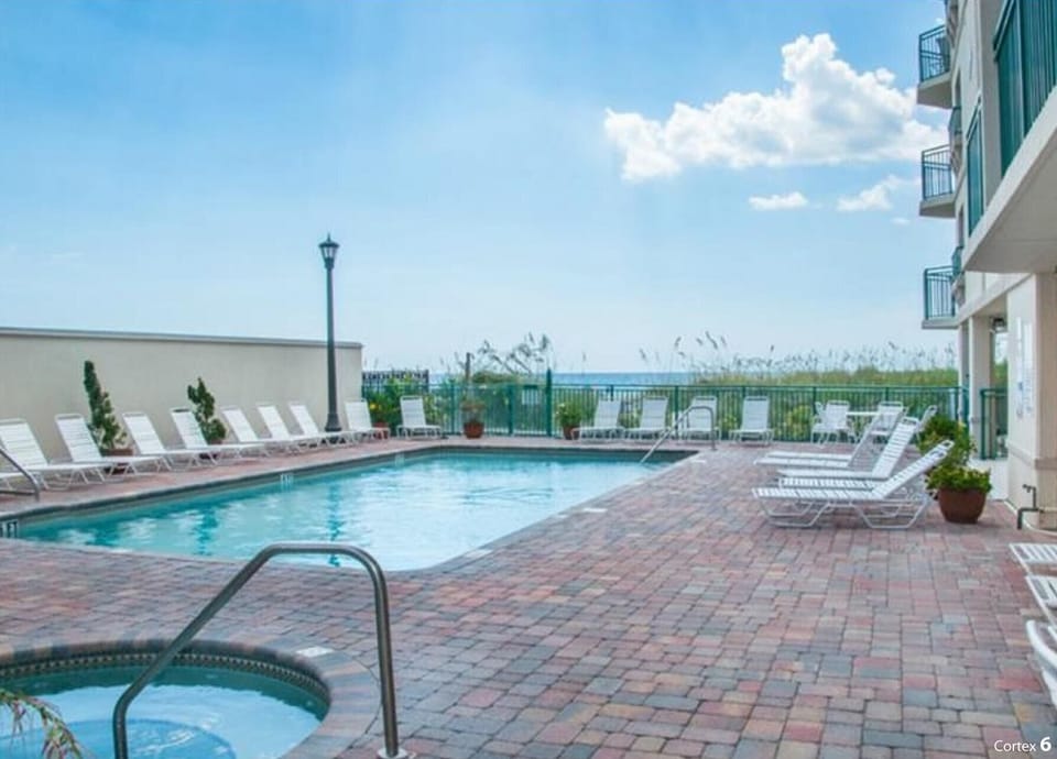 Close up of pool which leads to beach 