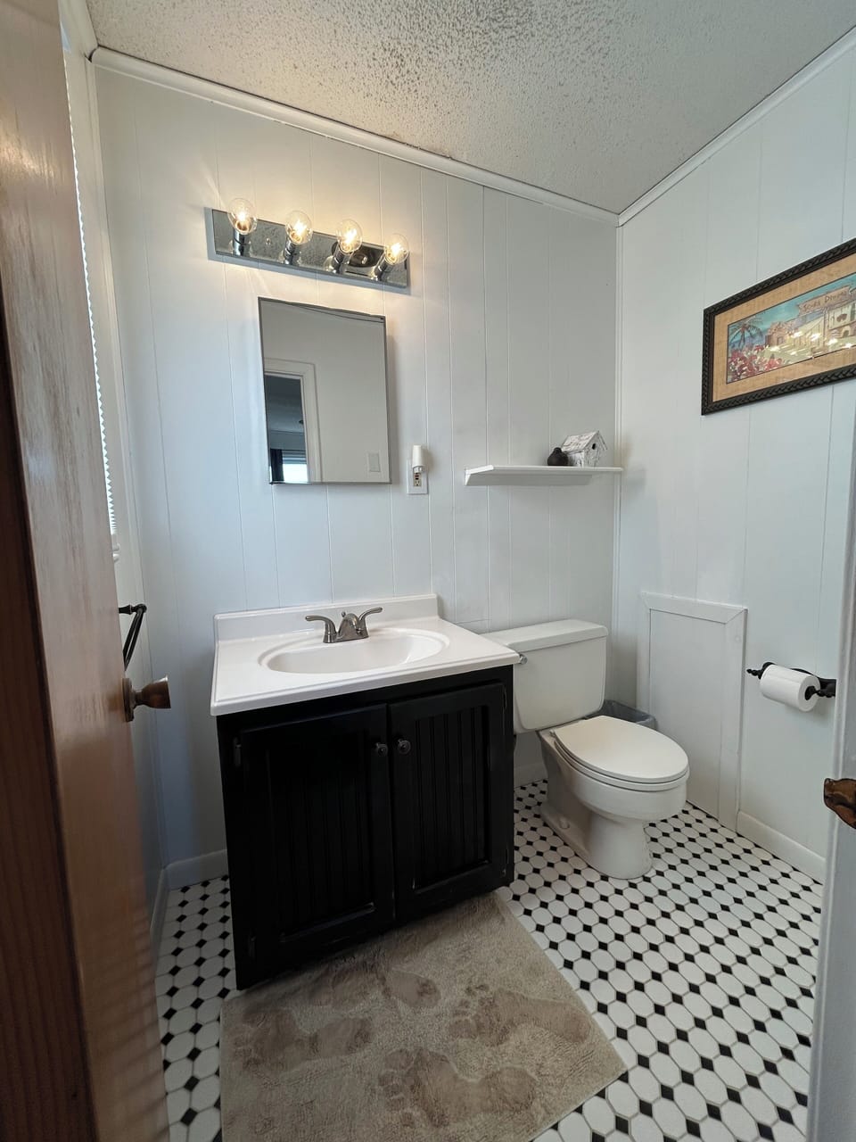 Half bath off of king bedroom.