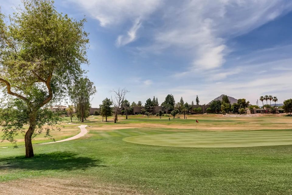 Located directly on the prestigious Continental Golf Course! Stunning views of Camelback Mtn right from your private balcony.