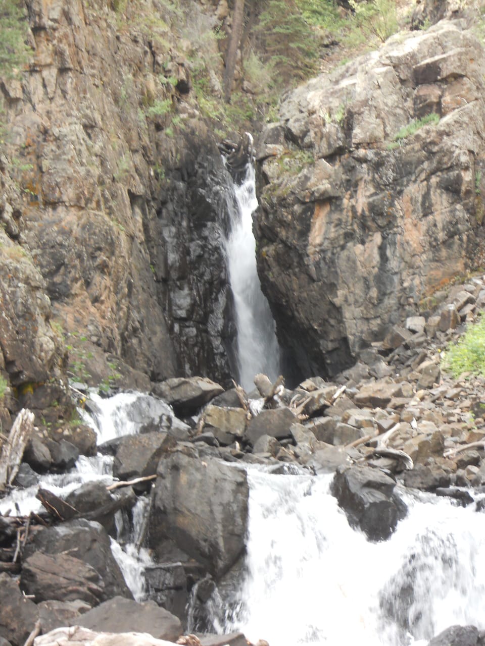 Listen to the Cascade Creek waterfall a short (steep) hike from the cabin.