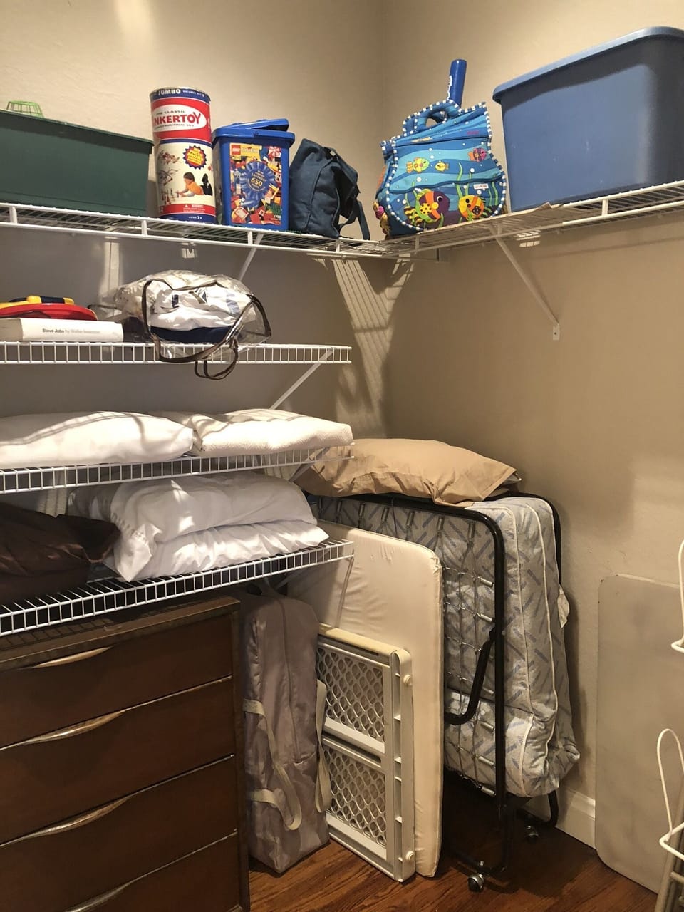 Master closet with toys, 2 Pac'N'Plays, baby gate and bed rail.