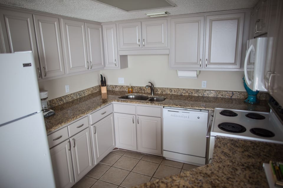 Kitchen - Refinished Cabinets and Granite Countertops