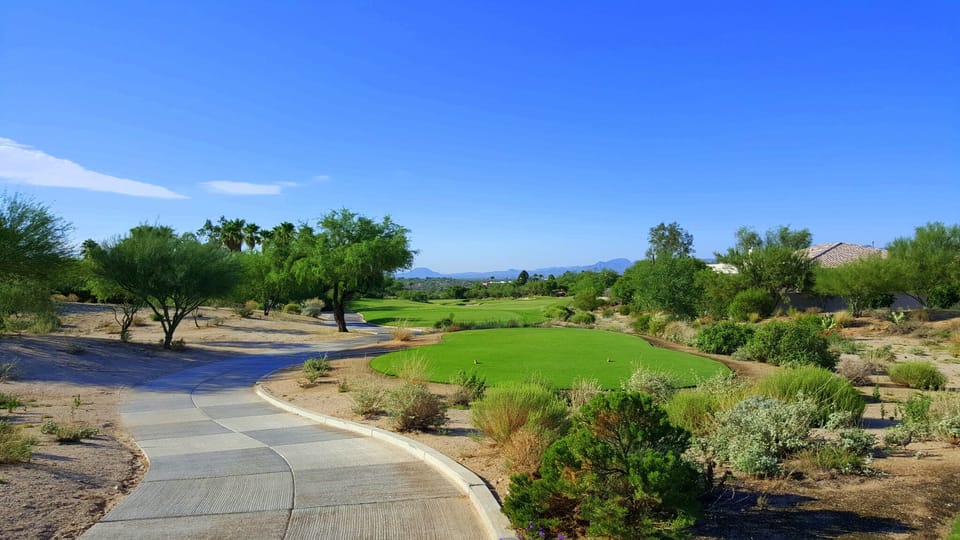 Green fairways and beautiful sunny blue skies