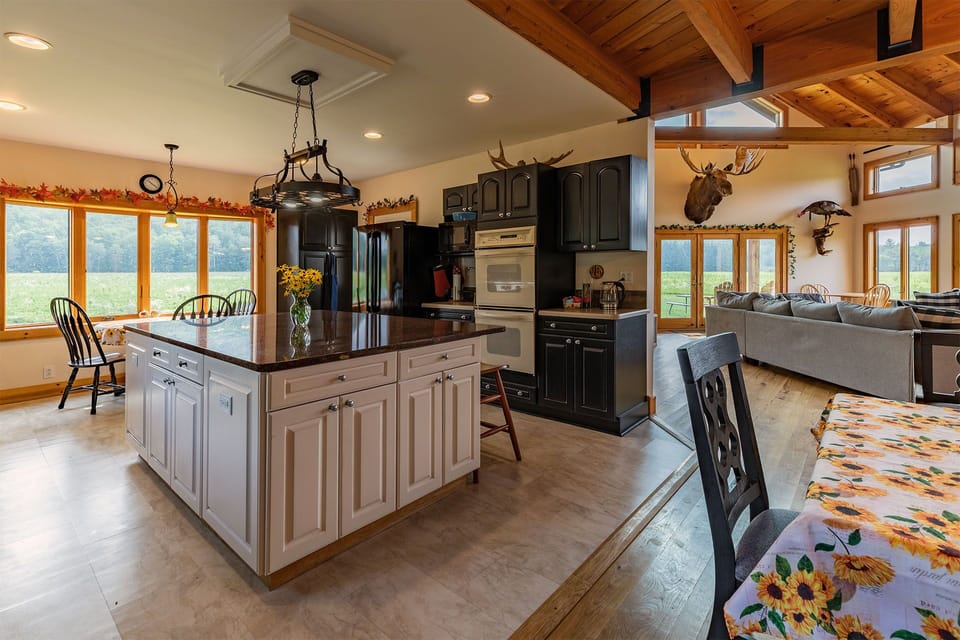 Open concept Kitchen/Dining/Living area