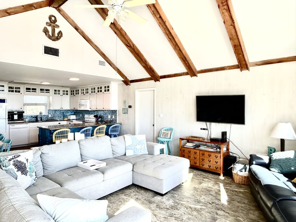 Main living space with vaulted ceiling