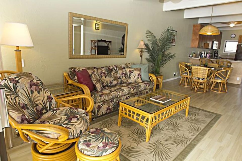 Living room facing the dining area and kitchen