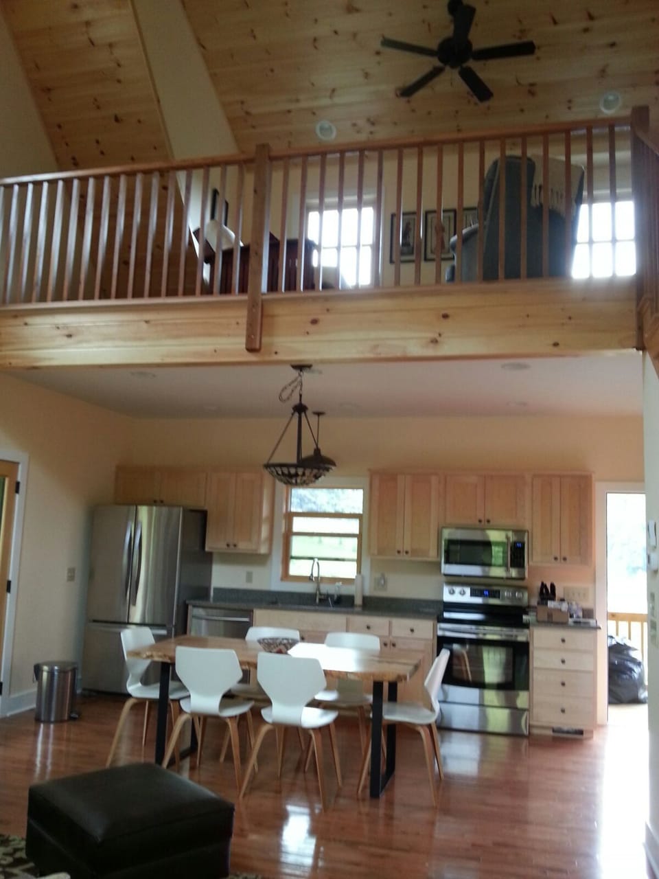 Vaulted ceiling in main living area with beautiful tongue and groove panels.