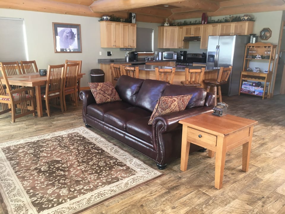 Large open living area with a queen size sofa sleeper