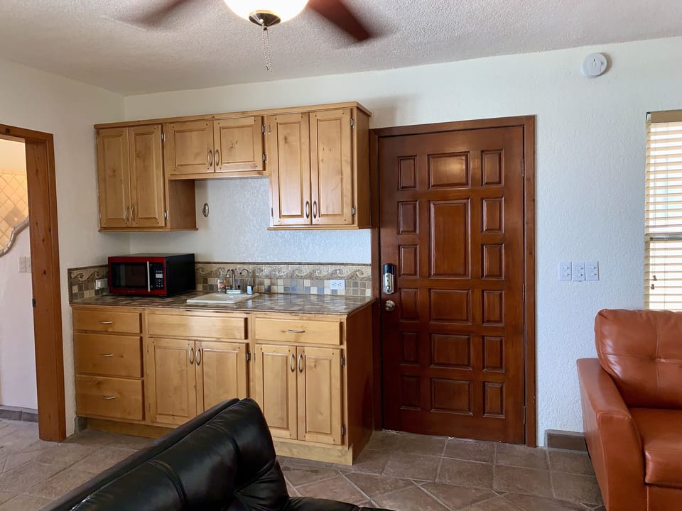 Casita Uno Kitchenette. There is also a small refrigerator.  