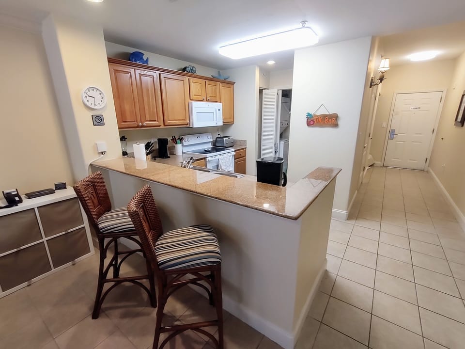 Fully updated kitchen with seating at breakfast bar. 