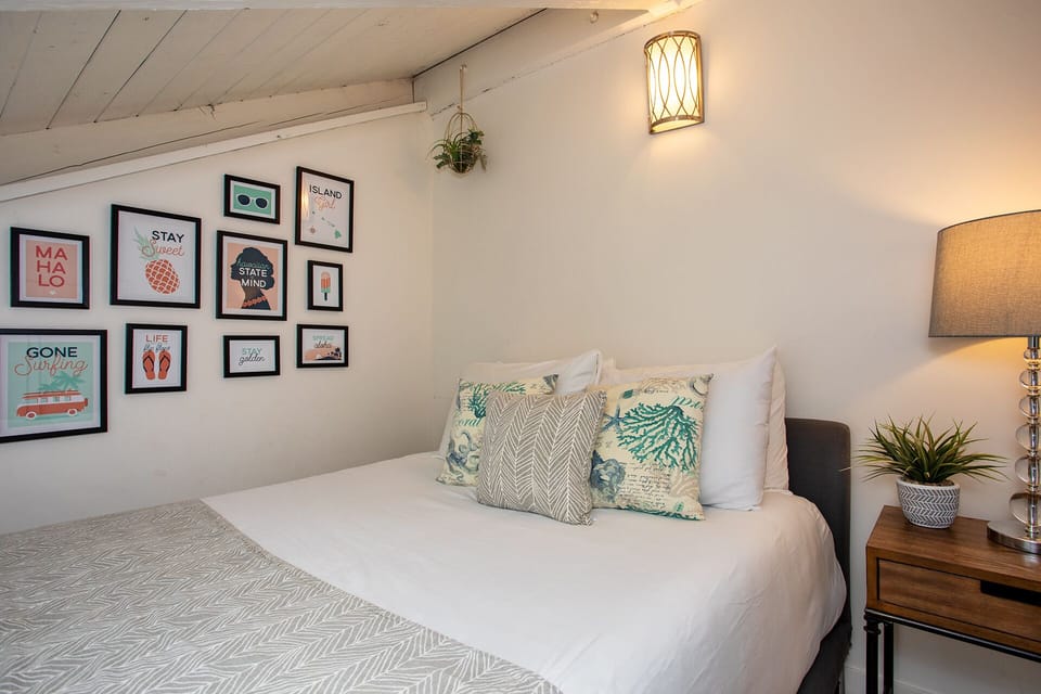 Smart TV in the room. Please make note of the slanted ceilings.