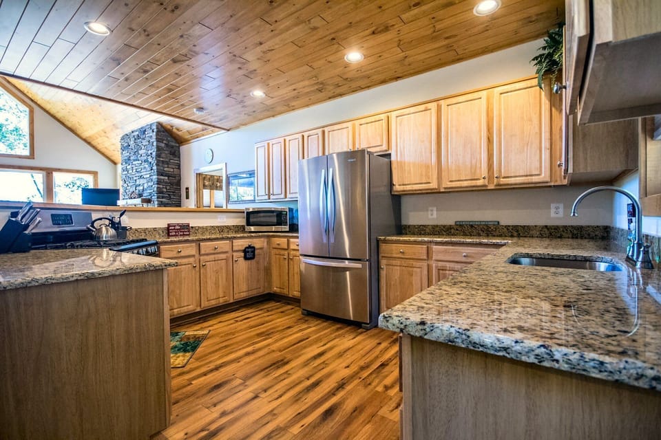 Full kitchen with stainless appliances and all the cookware you need