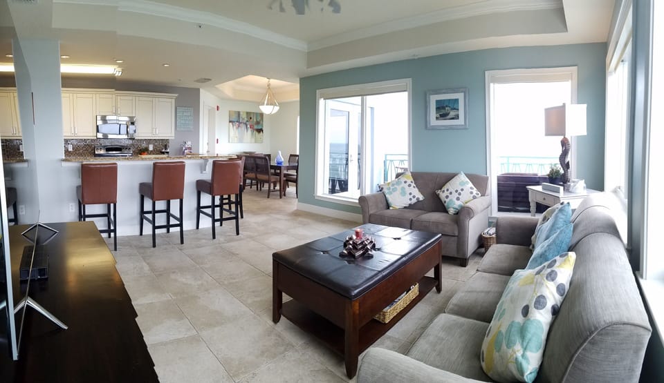 Living Room, Kitchen, and Dining Room.