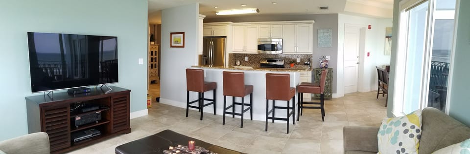 Living Room with 65" 4K HDTV.