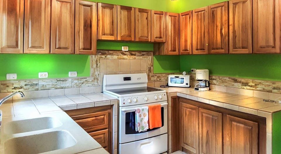 Electric stove, fridge toaster oven, 2nd coffee maker, glasses, dishes, etc.